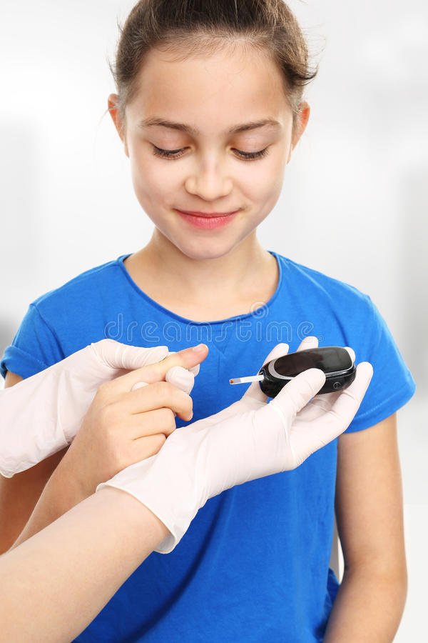 Blood Sugar Testing, Child Finger Lancet Punctures Stock Photo