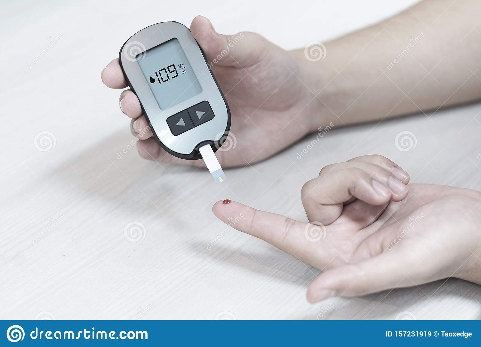 Diabetes Patients Use A Sugar Glucose Meter To Measure ...